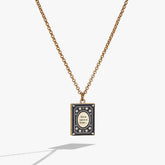 'A Reader Lives A Thousand Lives' Book Club Locket Pendant - Aaria Tees