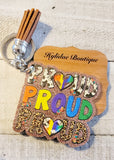 PROUD PROUD PROUD • Tassel Keychain Aaria Tees
