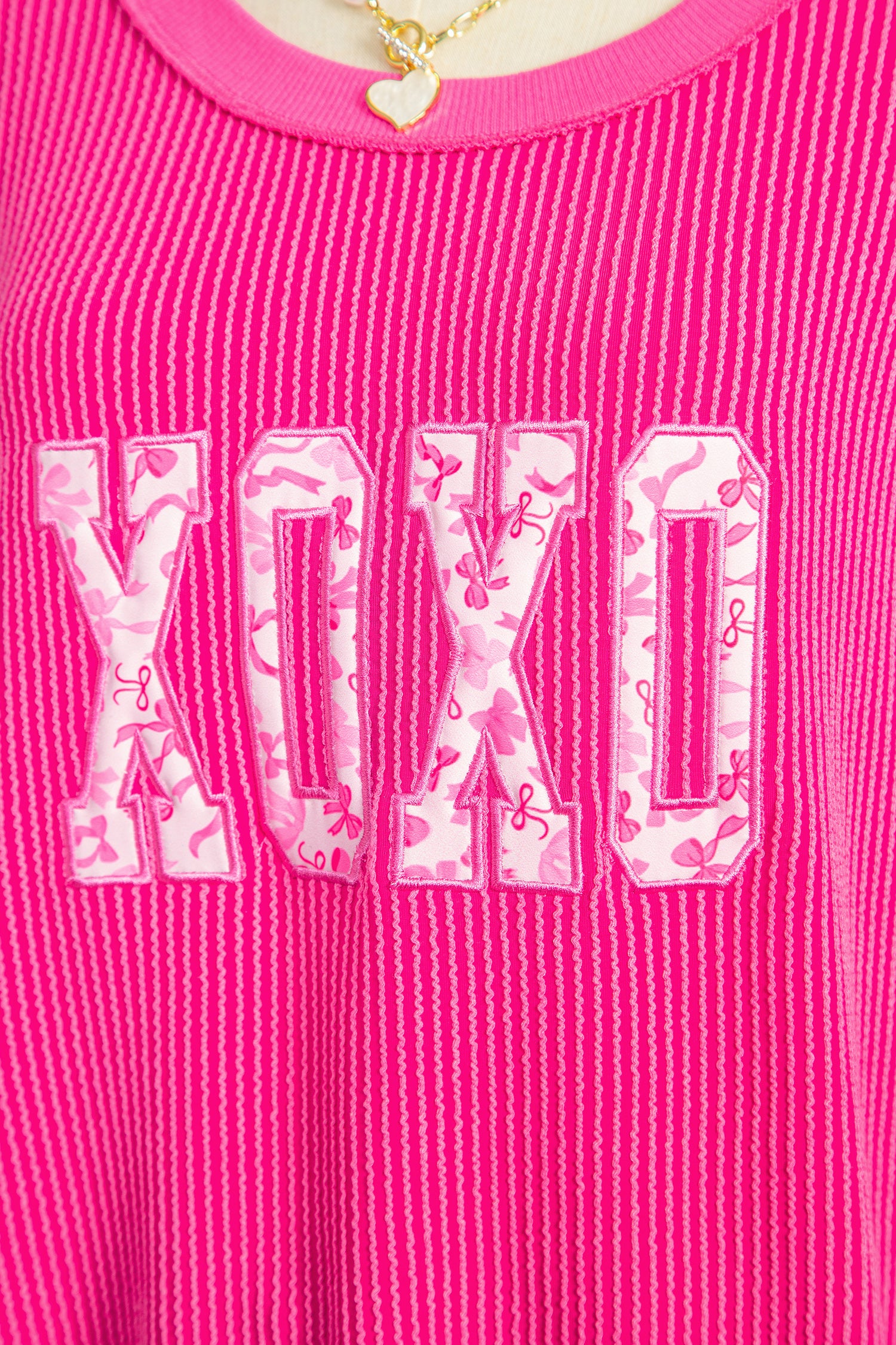 Strawberry Pink Twisted Ribbed Long Sleeve XOXO Bow Print Embroidered Patch Graphic Top - Aaria Tees Aaria Tees