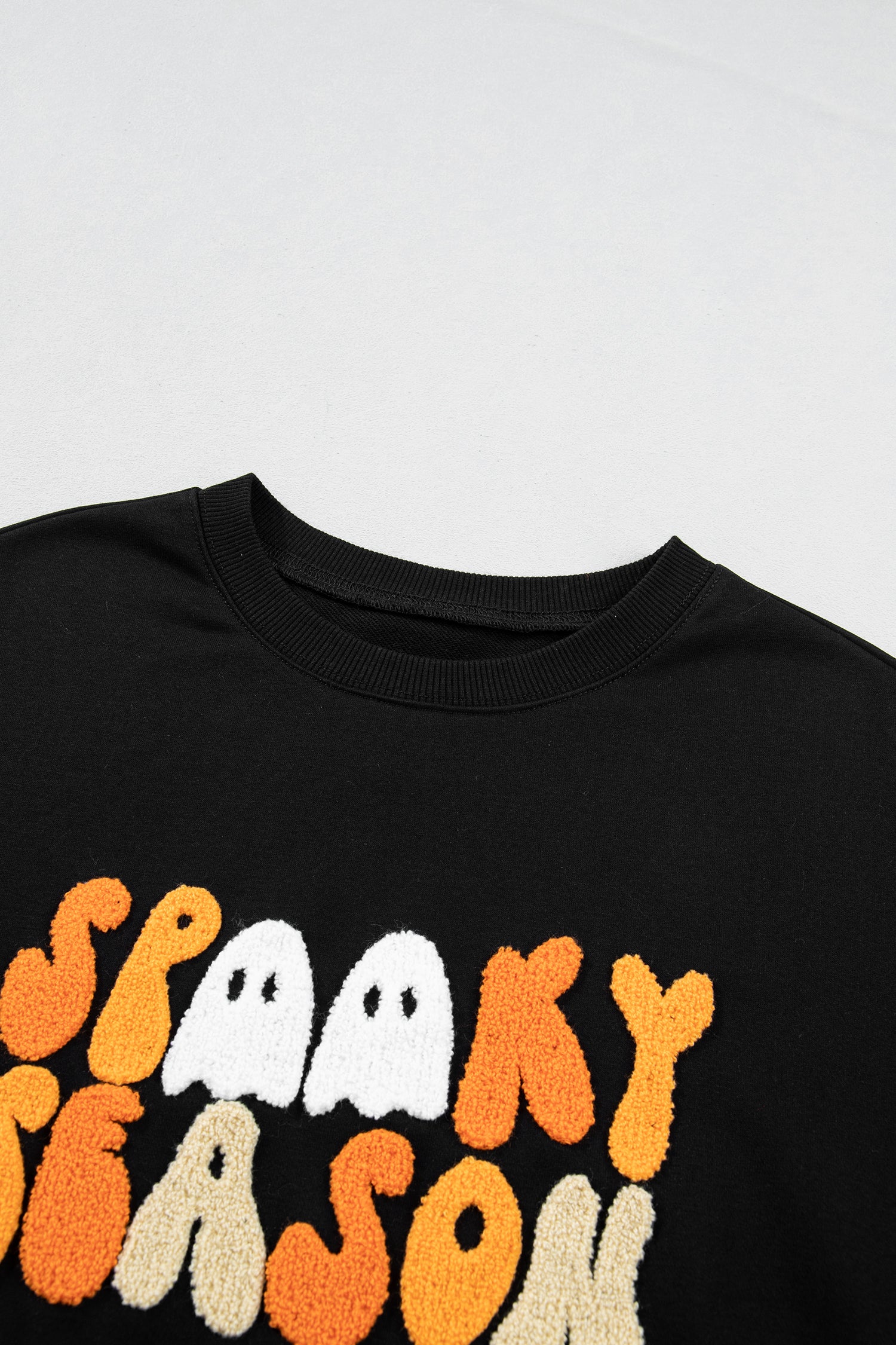 Color black Embroidered Spooky Season Graphic Long Sleeve Round Neck Pullover Sweatshirt - Aaria Tees Aaria Tees