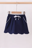 Navy scallop hem bow skort Aaria Tees