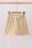 Khaki scallop hem bow skort Aaria Tees