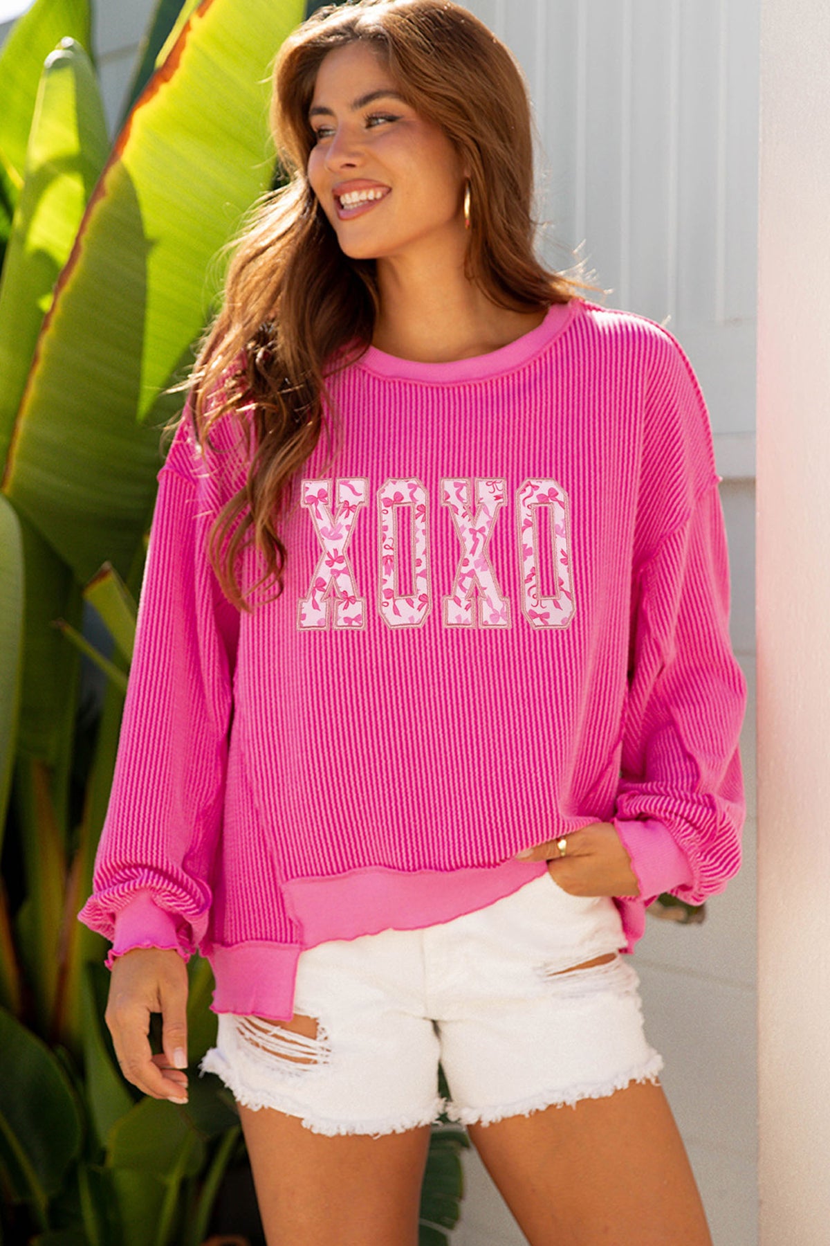 Strawberry Pink Twisted Ribbed Long Sleeve XOXO Bow Print Embroidered Patch Graphic Top - Aaria Tees
