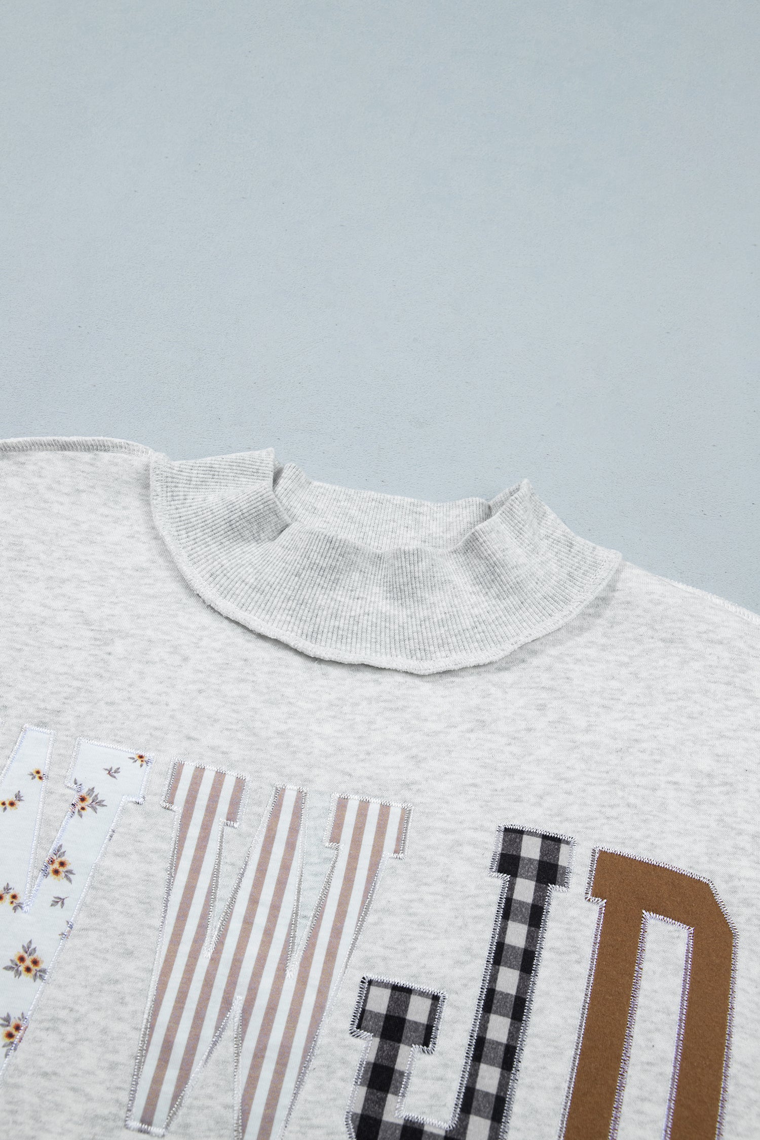 Gray WWJD Mixed Pattern Embroidered Patch Graphic Mock Neck Sweatshirt - Aaria Tees Aaria Tees