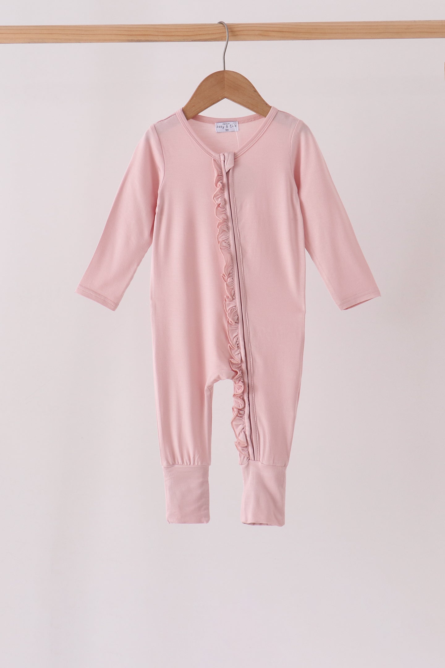 Pink ruffle zipper bamboo anti-slip romper – wholesale for boutiques | Honeydew USA Aaria Tees