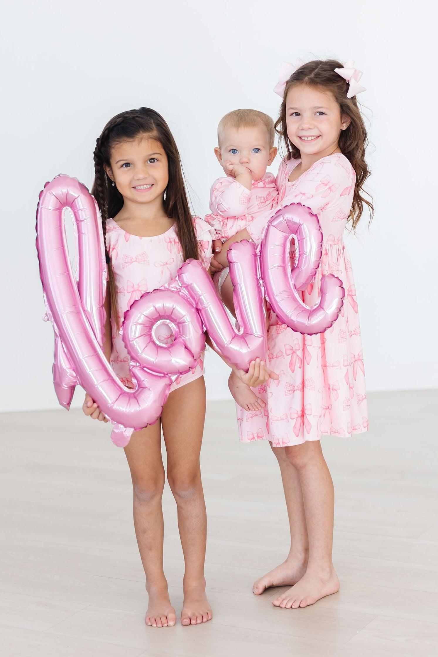 Blushing Bows 3/4 Sleeve Twirl Bodysuit - Aaria Tees Aaria Tees