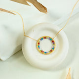 Rainbow Gemstone Halo Necklace Aaria Tees