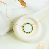 Blue Gemstone Halo Necklace Aaria Tees