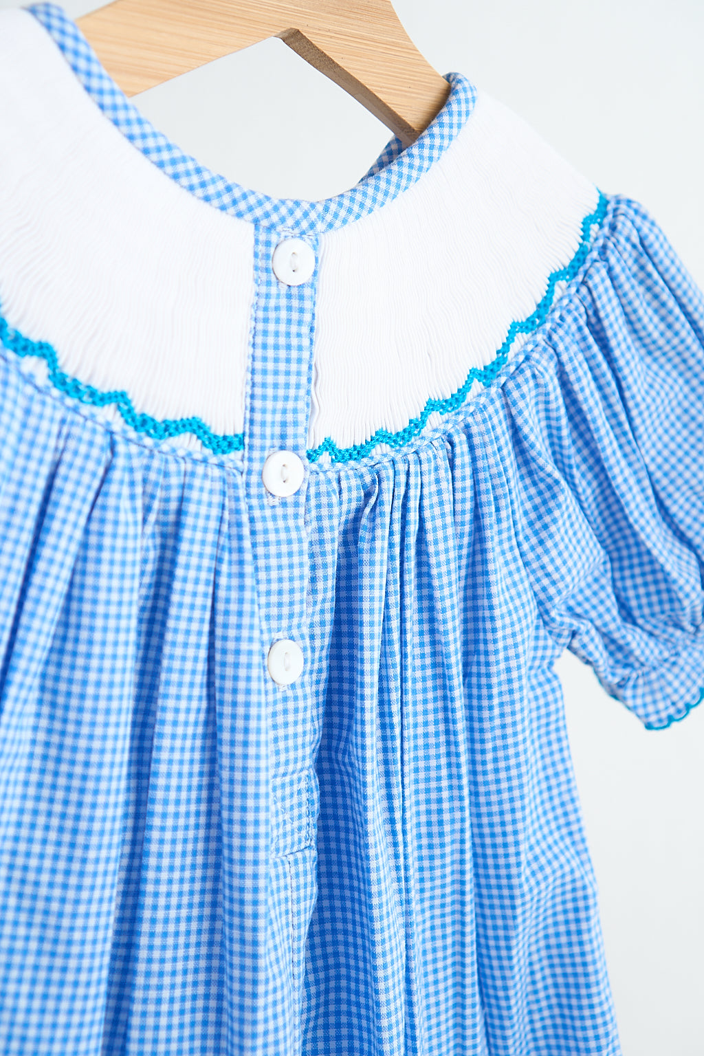 Blue snow princess hand smocked gingham girl romper - Aaria Tees Aaria Tees