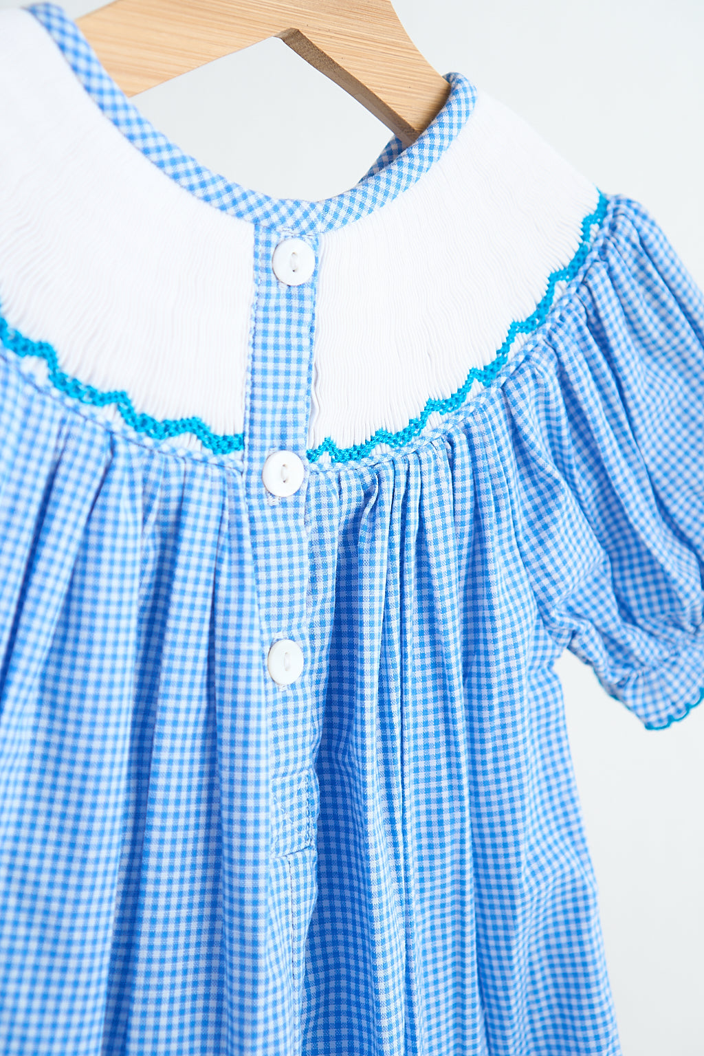 Blue snow princess hand smocked gingham girl romper - Aaria Tees Aaria Tees
