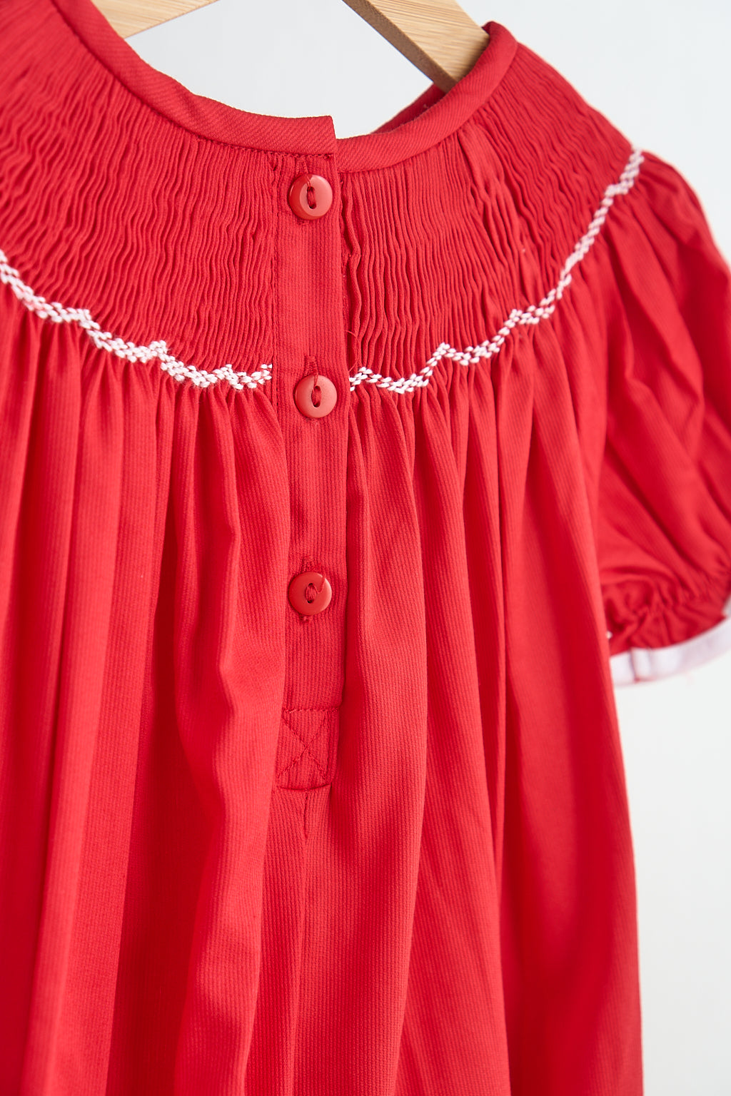 Red candy hand smocked girl romper - Aaria Tees Aaria Tees