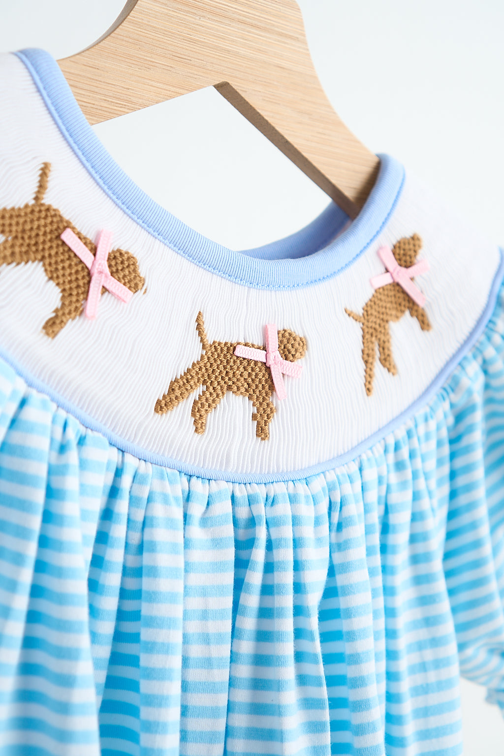 Blue puppy hand smocked girl romper - Aaria Tees Aaria Tees