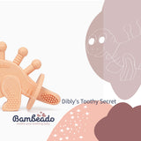 Dibly - Pink - Baltic Amber & Natural Rubber Dinosaur Teether with Toothbrush Tail - Aaria Tees Aaria Tees