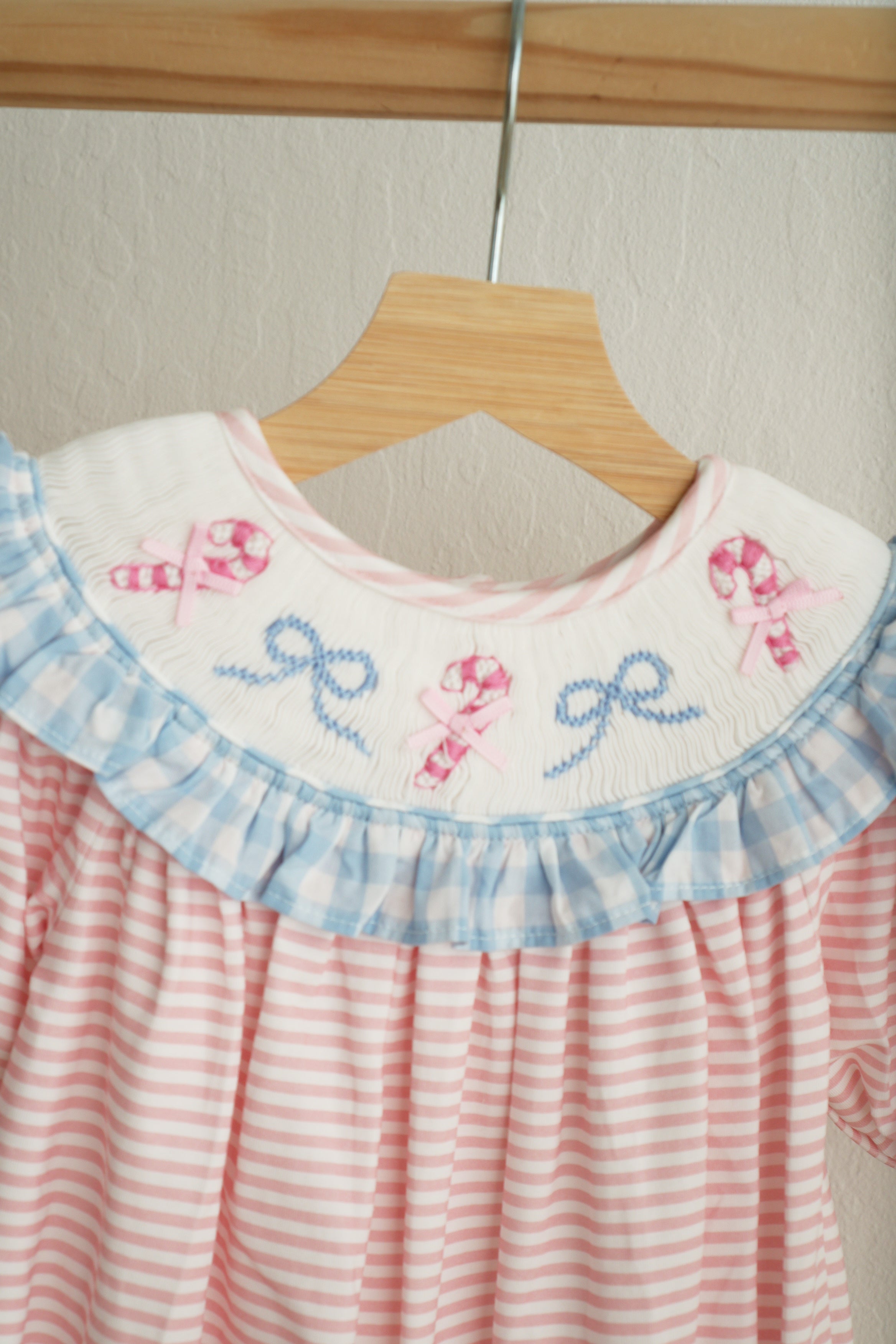 Pink candy cane bow hand smocked ruffle romper - Aaria Tees Aaria Tees