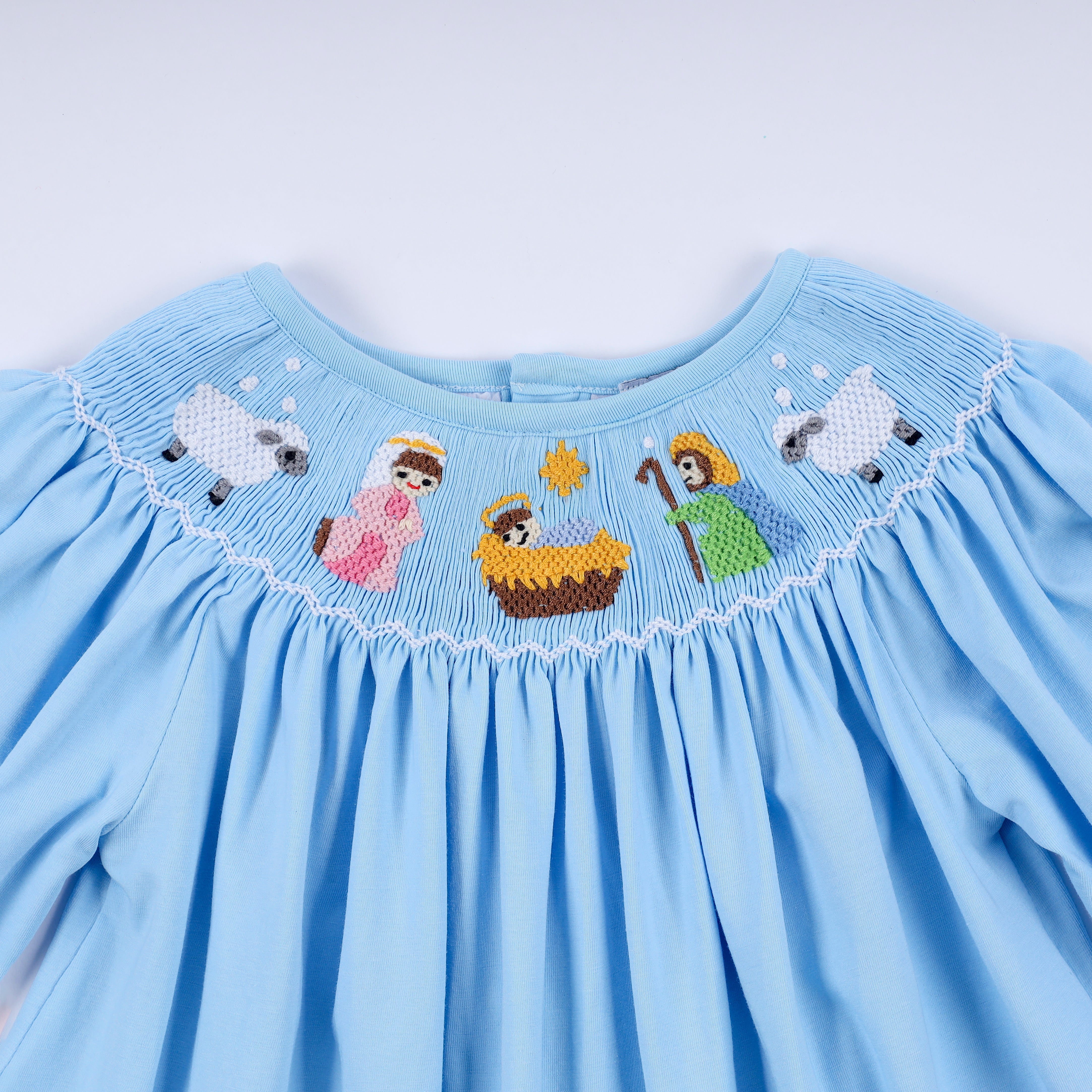 Blue nativity hand smocked dress - Aaria Tees Aaria Tees