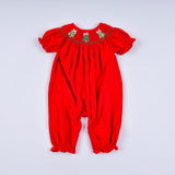 Red baby romper with green embroidery on a white background Aaria Tees