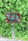 CNA Floral on Teal Leopard Badge Reel Aaria Tees