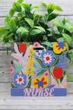 NURSE Large Multi-Color Floral Badge Buddy Aaria Tees