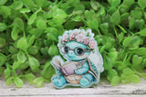 Floral Crown Reading Turtle Badge Reel Aaria Tees