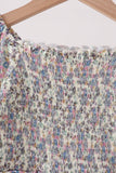 Blue floral smocked jumpsuit Aaria Tees