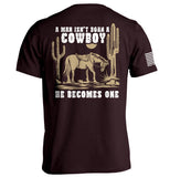 A Man Isn't Born A Cowboy Aaria Tees