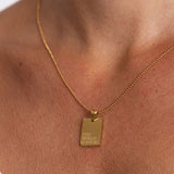 The World Is Yours Necklace Aaria Tees
