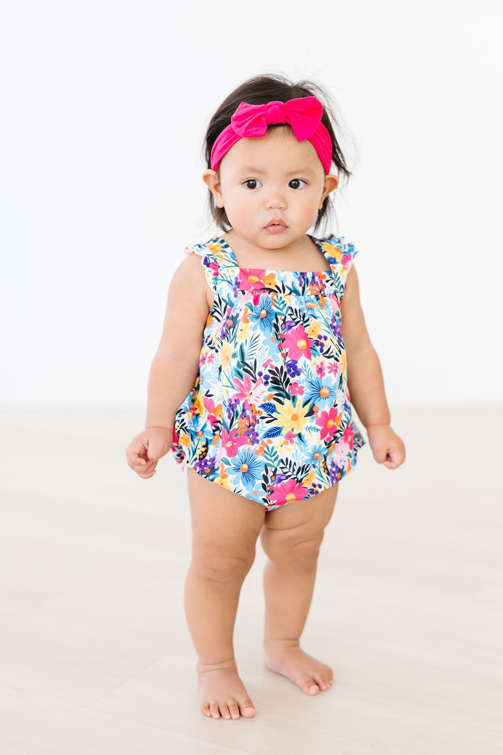 Petal Paradise Ruffle Cross Back Romper - Aaria Tees Aaria Tees