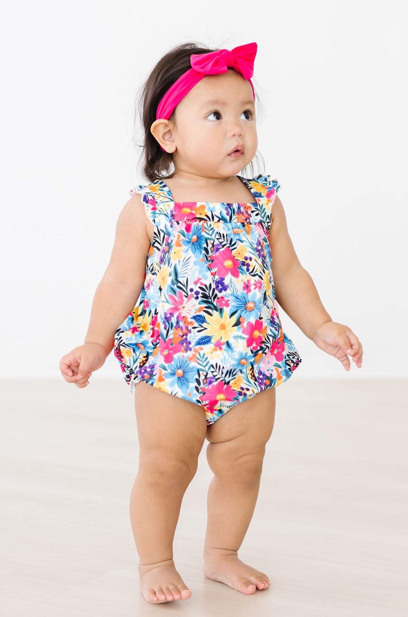 Petal Paradise Ruffle Cross Back Romper - Aaria Tees Aaria Tees