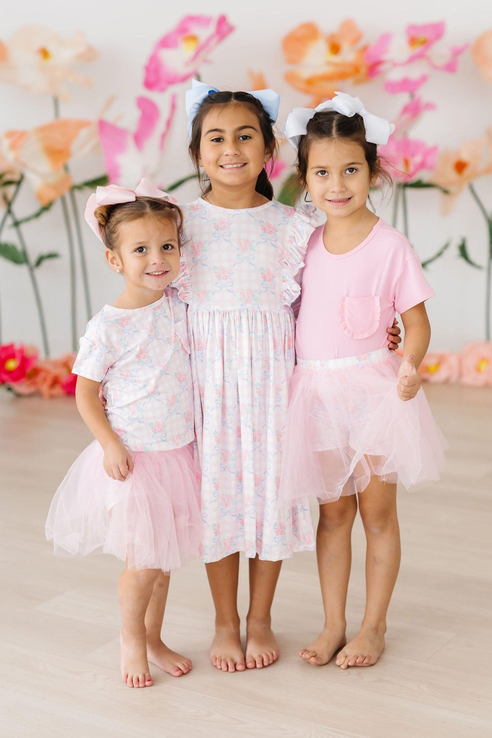 Ribbons & Roses Ruffle Pocket Tee - Aaria Tees Aaria Tees