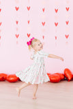 Rosebud Bows Smocked Ruffle Dress - Aaria Tees Aaria Tees