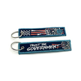 Trust the Government Jet Tag Keychain Aaria Tees
