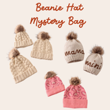 Collection of beanies with pom-poms and text 'mama' and 'mini' on a beige background. Aaria Tees