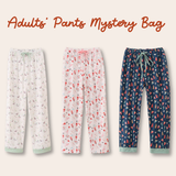 Three pairs of patterned pants on a beige background with text 'Adults' Pants Mystery Bag'. Aaria Tees