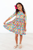 Floral Fiesta 3/4 Sleeve Pocket Twirl Dress - Aaria Tees Aaria Tees